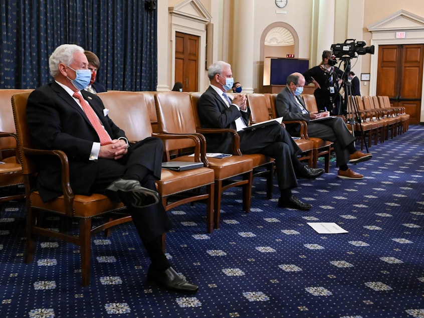caption: Members of congress practice social distancing as the House Rules Committee meets to consider a resolution authorizing remote voting by proxy in the House of Representatives during a public health emergency due to the coronavirus outbreak, and to formulate a rule on the newest coronavirus relief bill on Capitol Hill on Thursday.