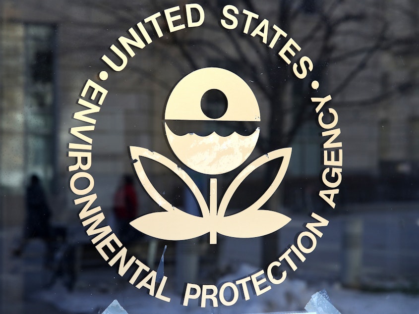 caption: The U.S. Environmental Protection Agency's (EPA) logo is displayed on a door at its headquarters on March 16, 2017 in Washington, DC.