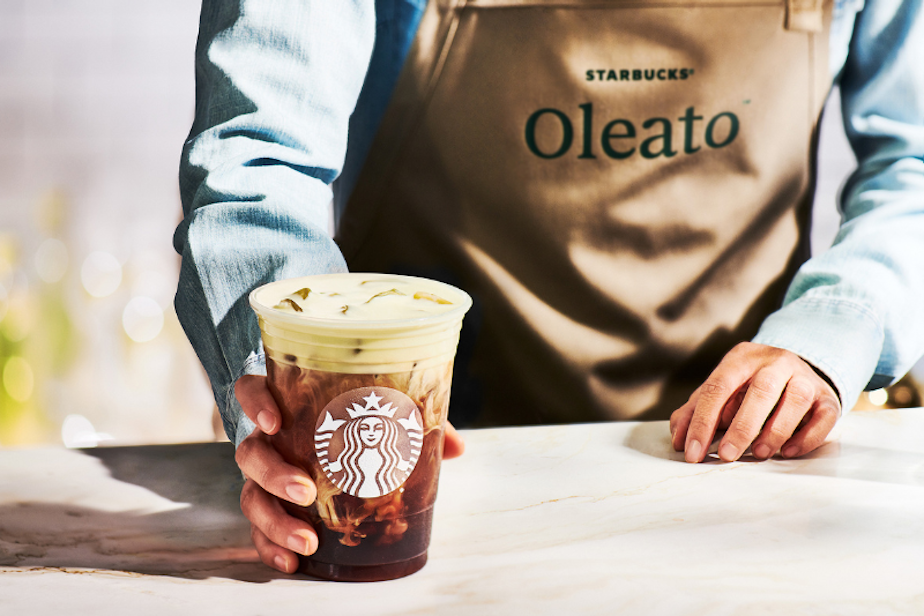 caption: Starbucks debuted its Oleato line of coffee drinks on Feb. 22, 2023 in Milan, Italy. Oleato adds olive oil to Starbucks drinks like lattes, cortados, or even an espresso martini.