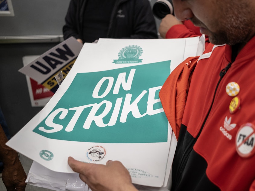 caption: Fliers from a recent UAW strike in Chicago.