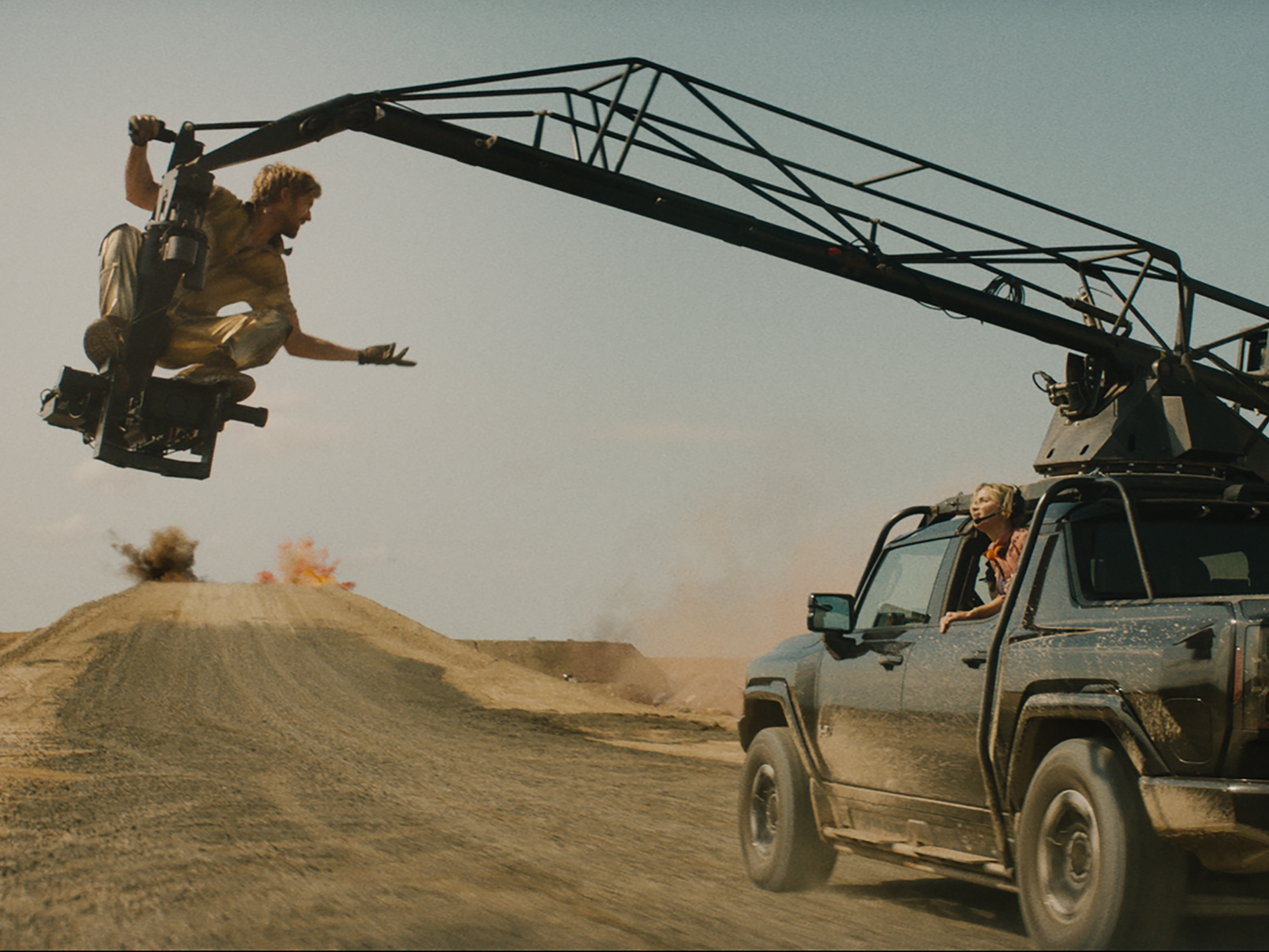 caption: Ryan Gosling plays a stuntman in the action movie <em>The Fall Guy.</em>