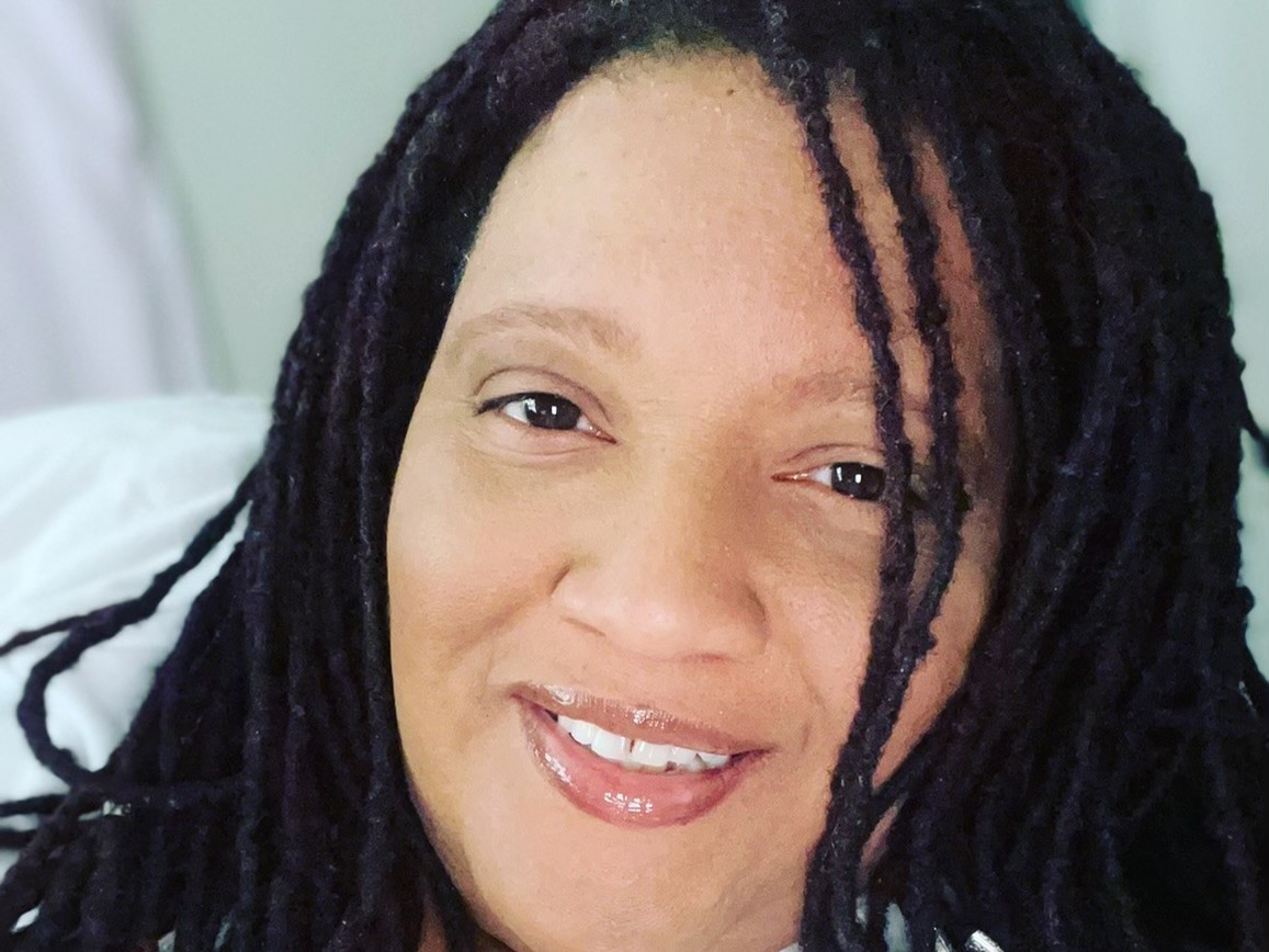 caption: Nikki Cox faced possible eviction this summer after her work hours were cut, and then she lost three weeks of pay after getting COVID-19.