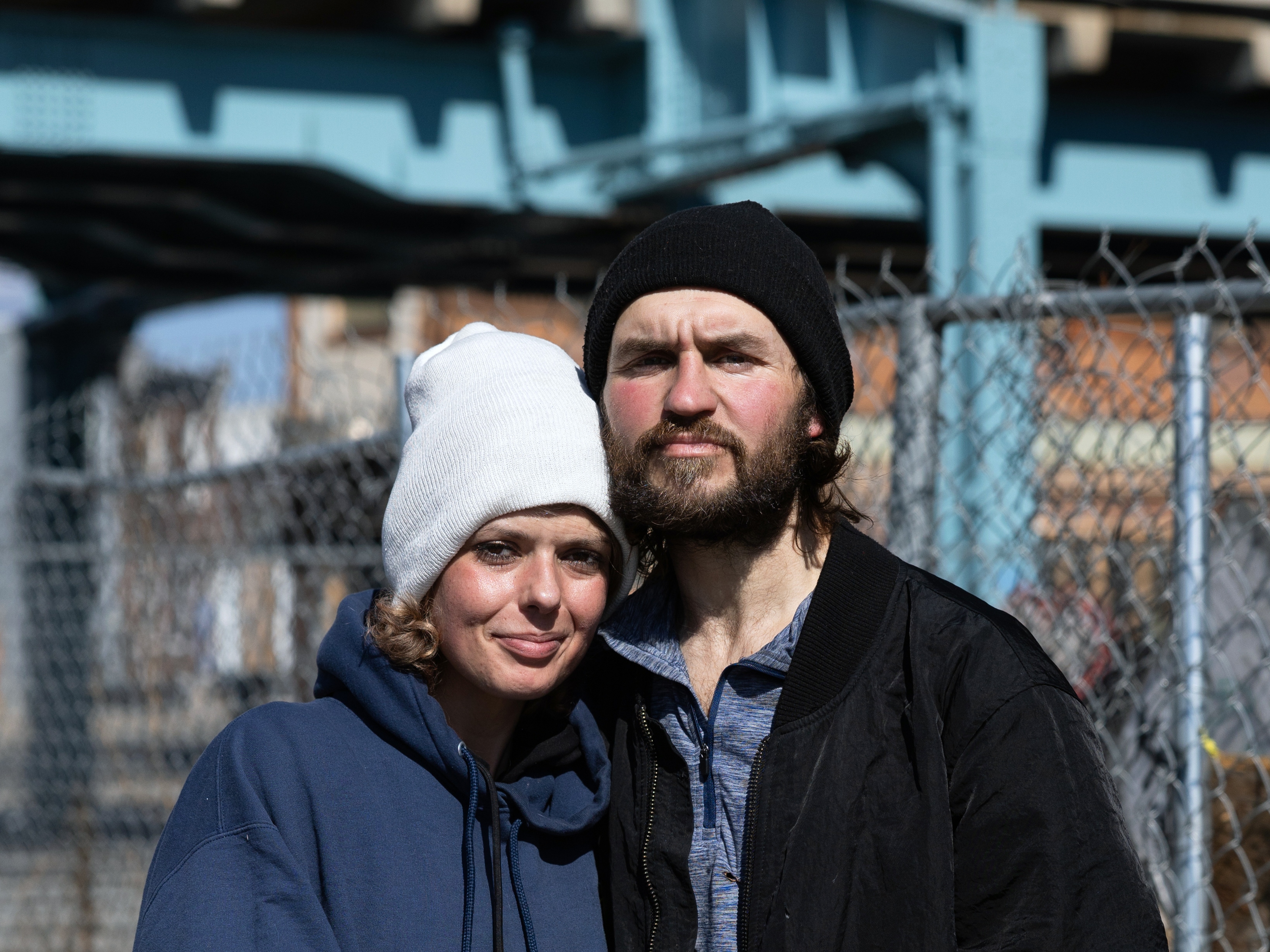 caption: Elena (left) and Vadim live on the street in Kensington, a neighborhood of Philadelphia, Pennsylvania, that has long struggled with fentanyl and other drug use.  Both told NPR they have survived their drug use in part due to naloxone, or Narcan, a medication that reverses opioid overdoses. NPR agreed not to use their last name because street drug use is illegal.