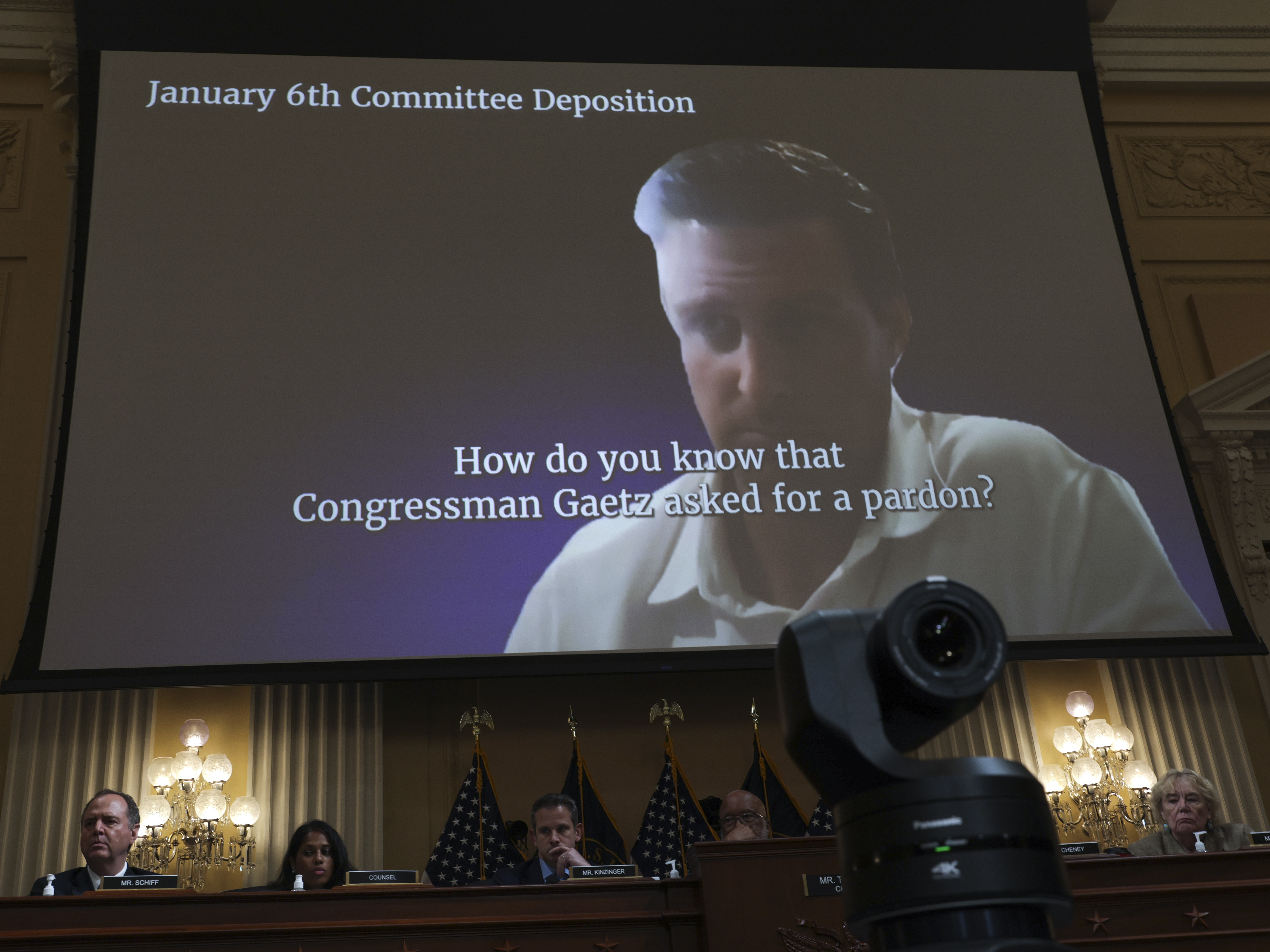 caption: A video displays a discussion about presidential pardons on Thursday during the fifth hearing by the House Select Committee to Investigate the January 6th Attack on the U.S. Capitol.