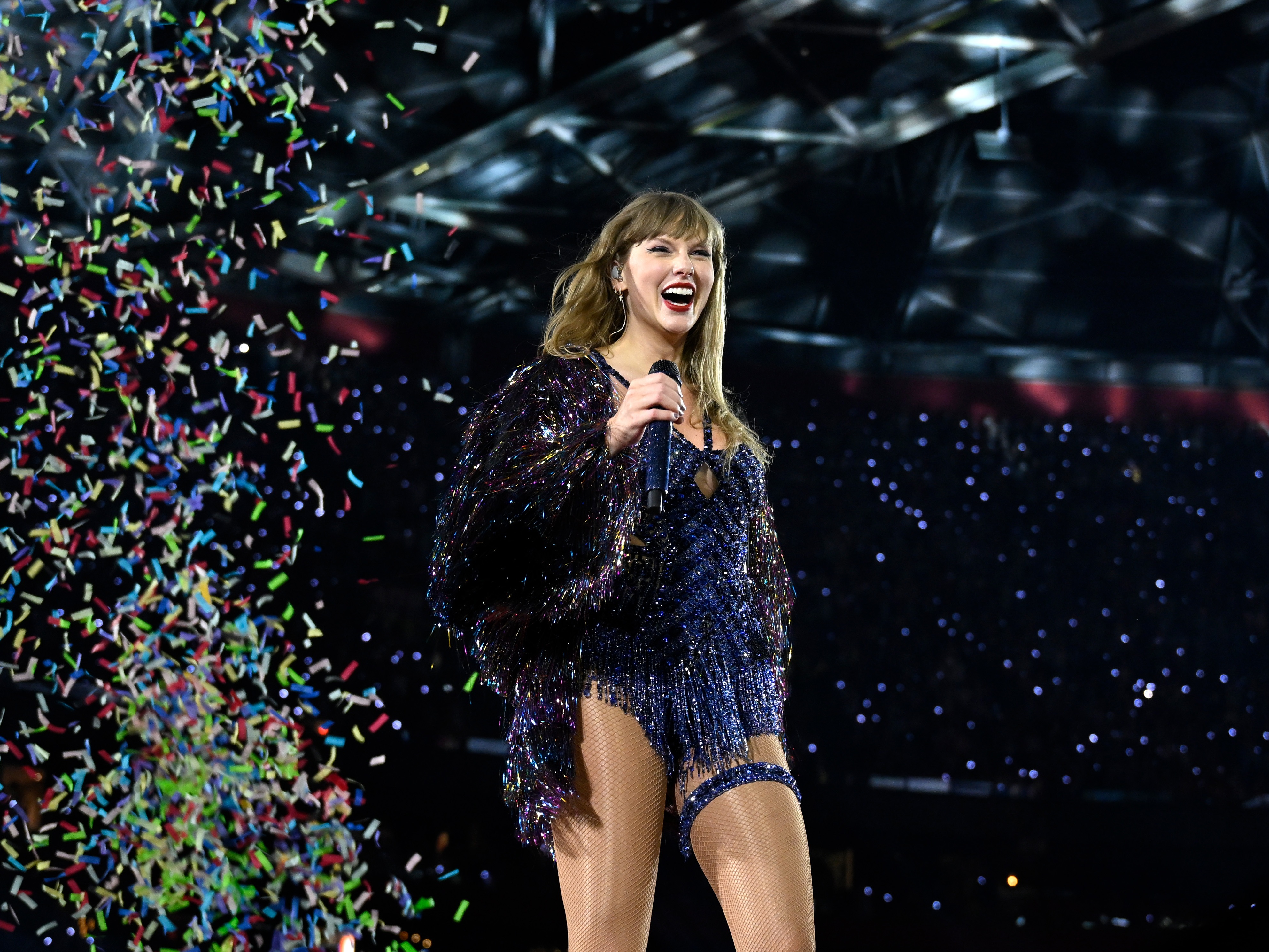 caption: Taylor Swift, pictured performing at Amsterdam's Johan Cruijff Arena in July, wrapped up her Eras Tour after 21 months and five continents.