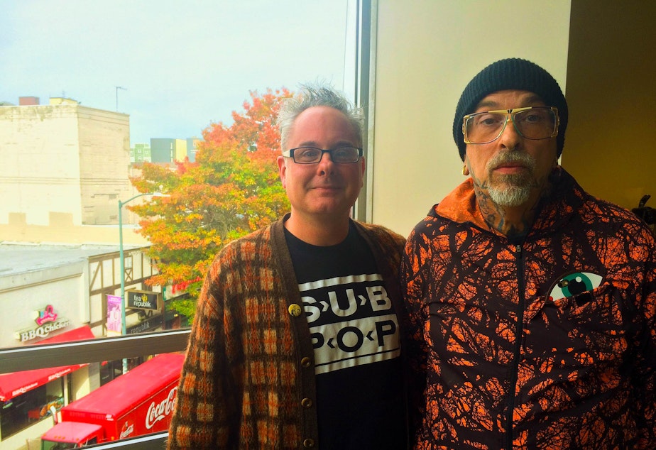 caption: Kurt B. Reighley and Mark Mitchell together at the KUOW studios.