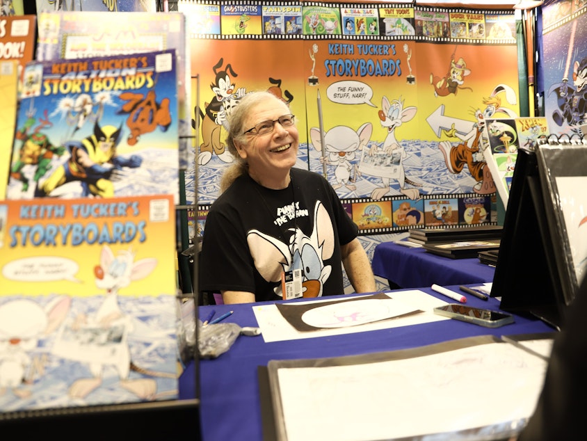 caption: Storyboard artist Keith Tucker has been in the animation business for about four decades, and he's been attending conventions since the 60s. He's worked on popular shows like Pinky and the Brain and Animaniacs, among many others.