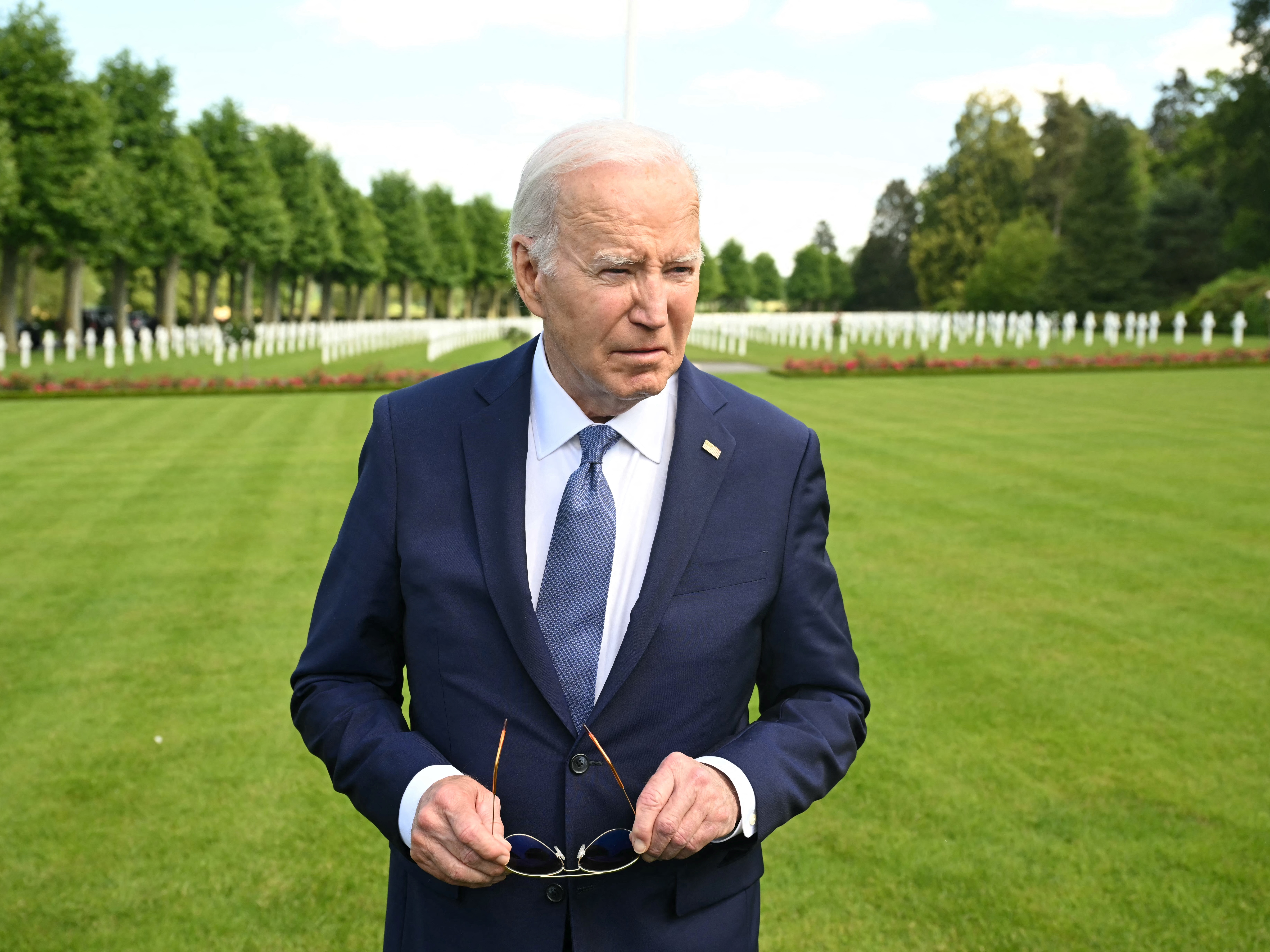 caption: President Biden visits the Aisne-Marne American Cemetery to pay his tribute to fallen US soldiers of the World War I, in Belleau, Northern France, on June 9, 2024.