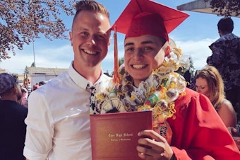 caption: Victor Campos (right) at his high school graduation with Reid Sundblad, his middle school teacher and mentor.