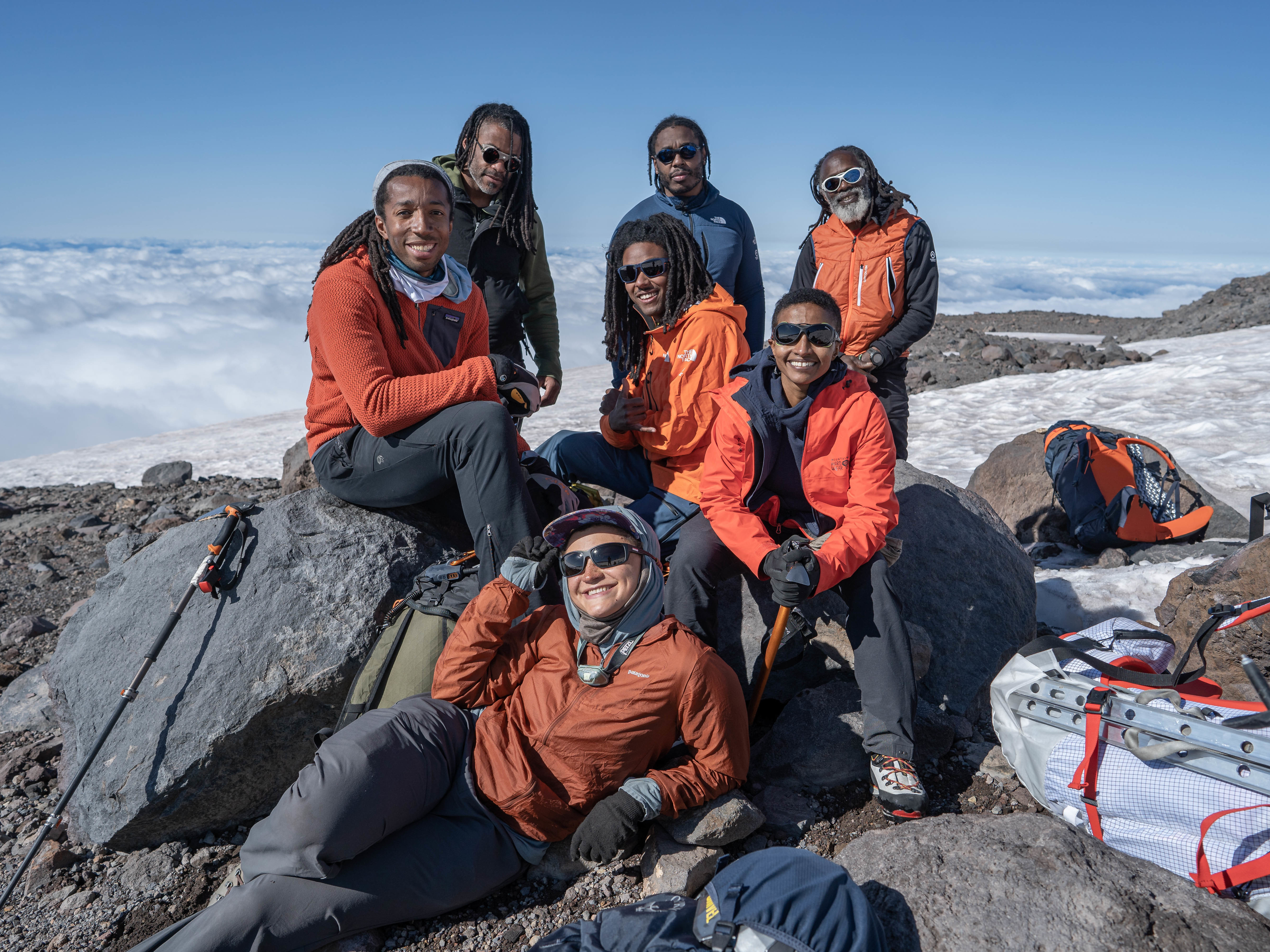 caption: Members of the Full Circle Everest team pose for a photo on Mount Rainier earlier this year. Next year, group members hope to become the first all-Black team to reach the top of Mount Everest.