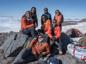 caption: Members of the Full Circle Everest team pose for a photo on Mount Rainier earlier this year. Next year, group members hope to become the first all-Black team to reach the top of Mount Everest.