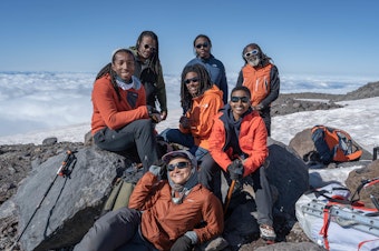 caption: Members of the Full Circle Everest team pose for a photo on Mount Rainier earlier this year. Next year, group members hope to become the first all-Black team to reach the top of Mount Everest.