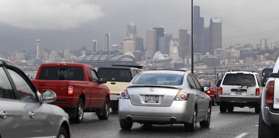 caption: The Seattle skyline behind heavy traffic on northbound Interstate 5 in 2011.