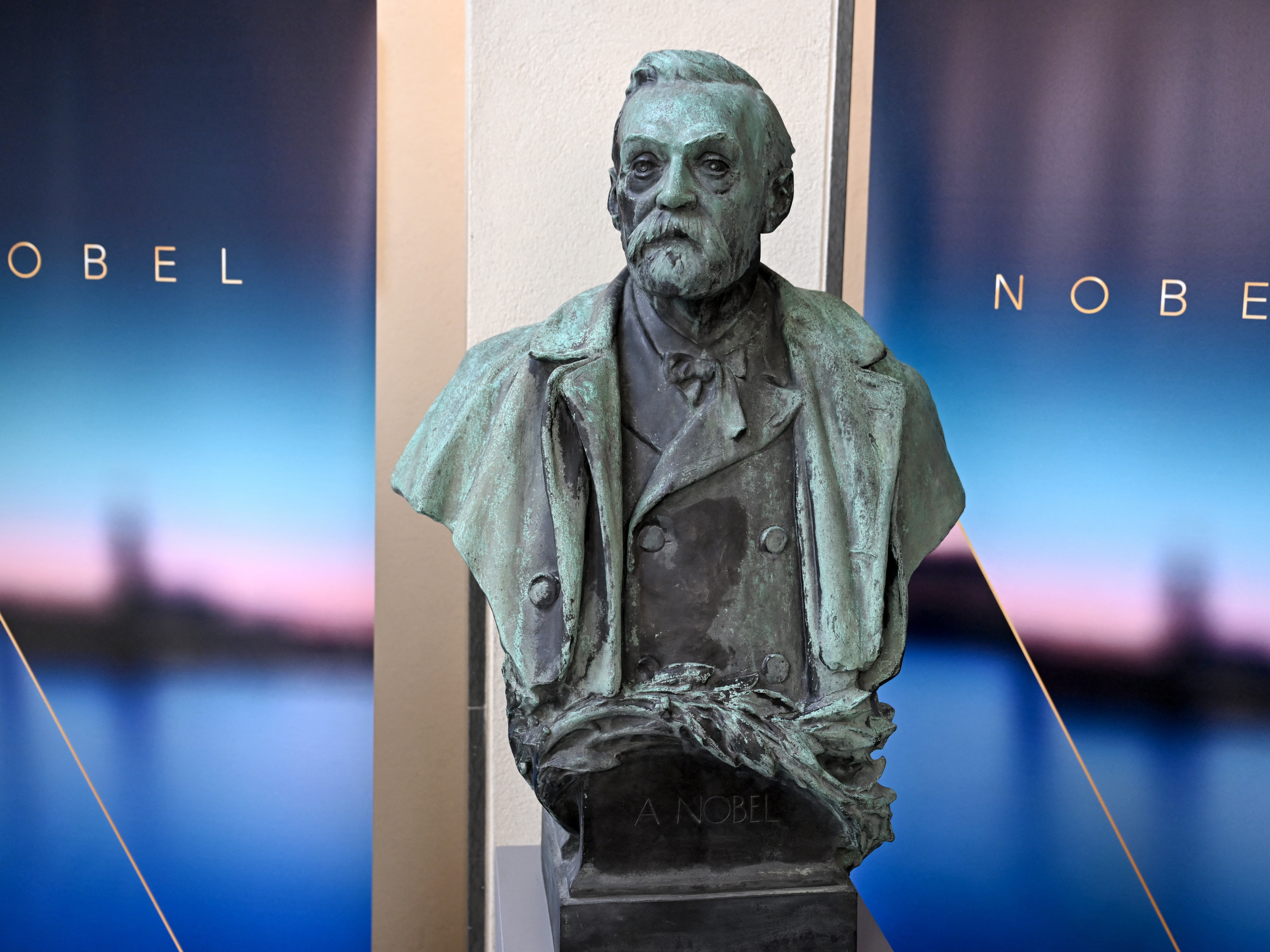 caption: A bust of Swedish chemist, inventor and businessman Alfred Nobel, founder and namesake of the Nobel Prizes, is pictured on October 6, 2025 at the Karolinska Institute in Stockholm, Sweden.