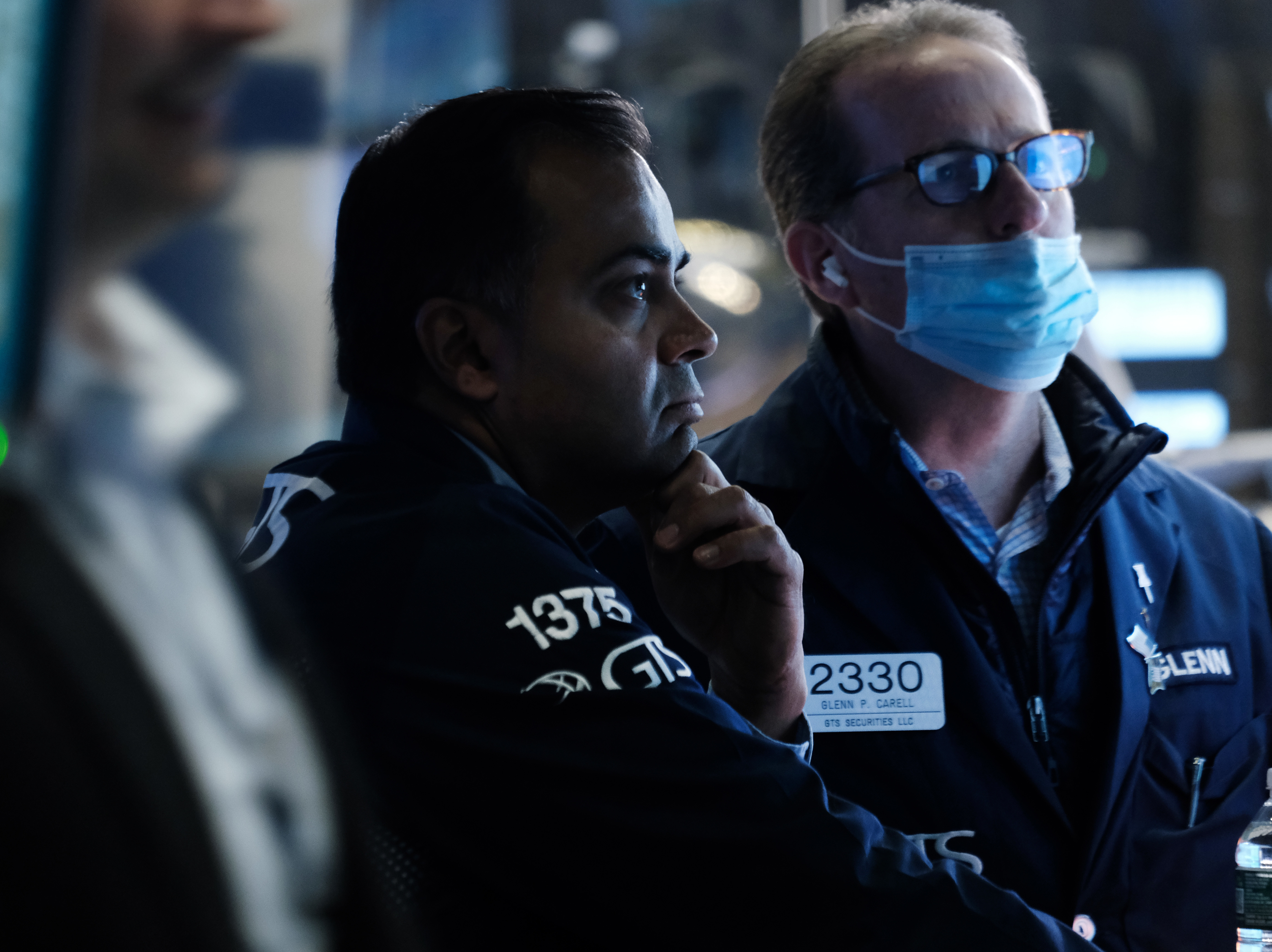 caption: Traders work on the floor of the New York Stock Exchange in New York City on Friday. Stocks slumped again on Monday as fears about inflation are proving hard to tamp down.