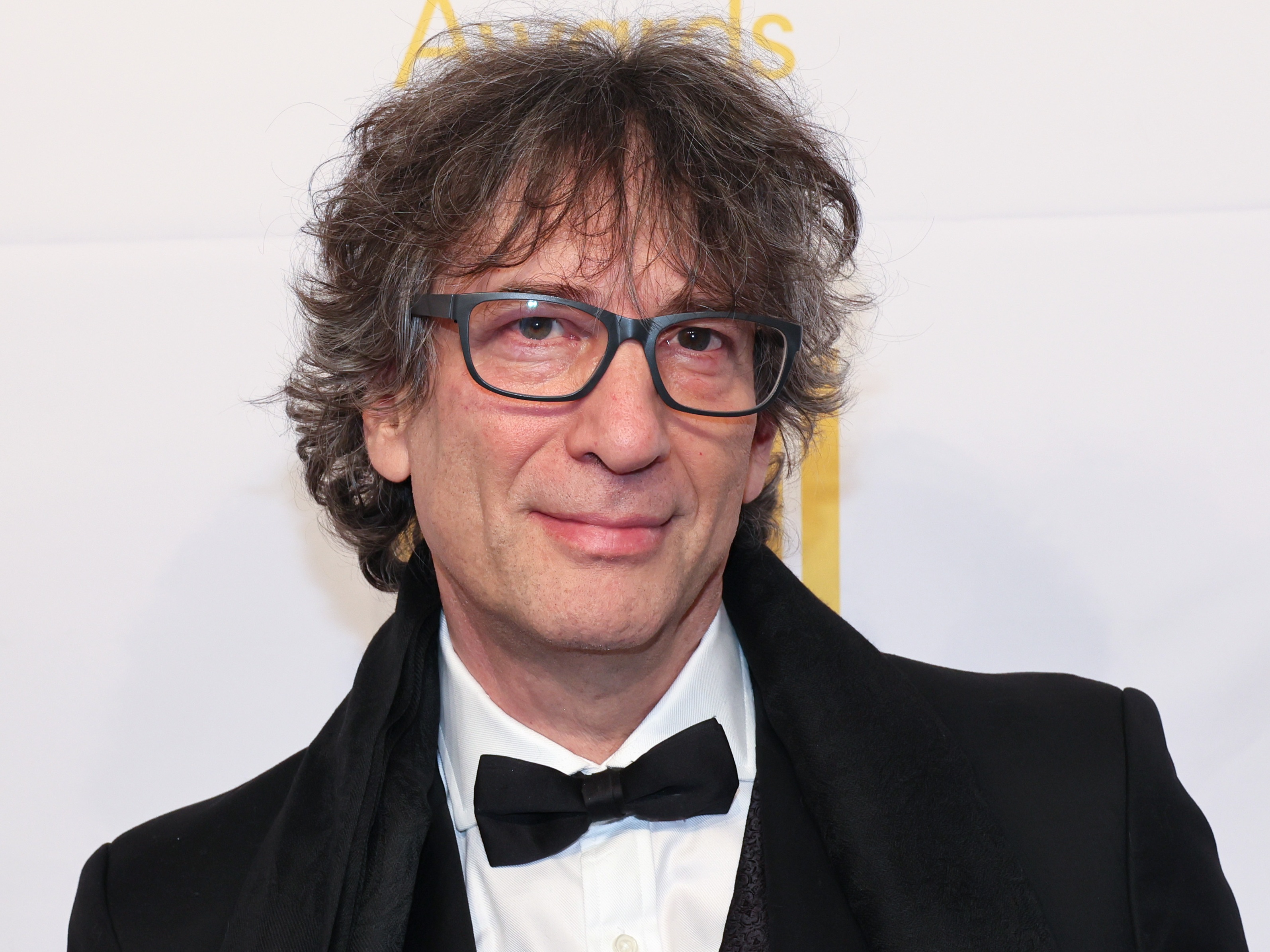 caption: Neil Gaiman attends the 73rd National Book Awards in November 2022 in New York City.