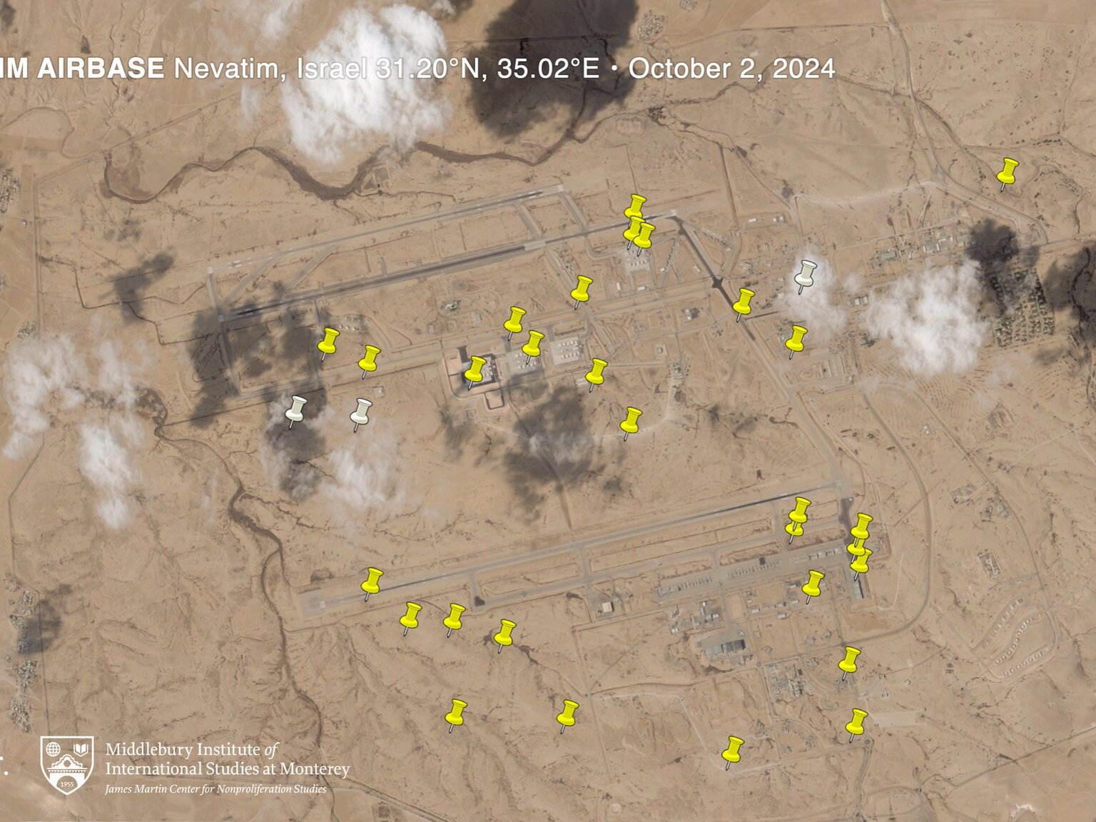 caption: Researchers counted about 32 points where missiles landed around Nevatim Airbase in southern Israel. Israel says no fighter jets were destroyed and the base continues to operate.