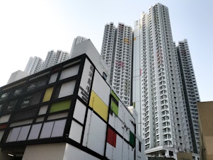 caption: A new apartment complex in Hong Kong, called the Chun Yeung Estate, is being turned into a quarantine center.
