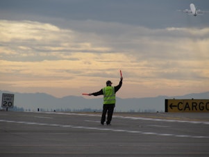 caption: Air cargo and passenger flights reached record highs at Seattle-Tacoma International Airport last year.