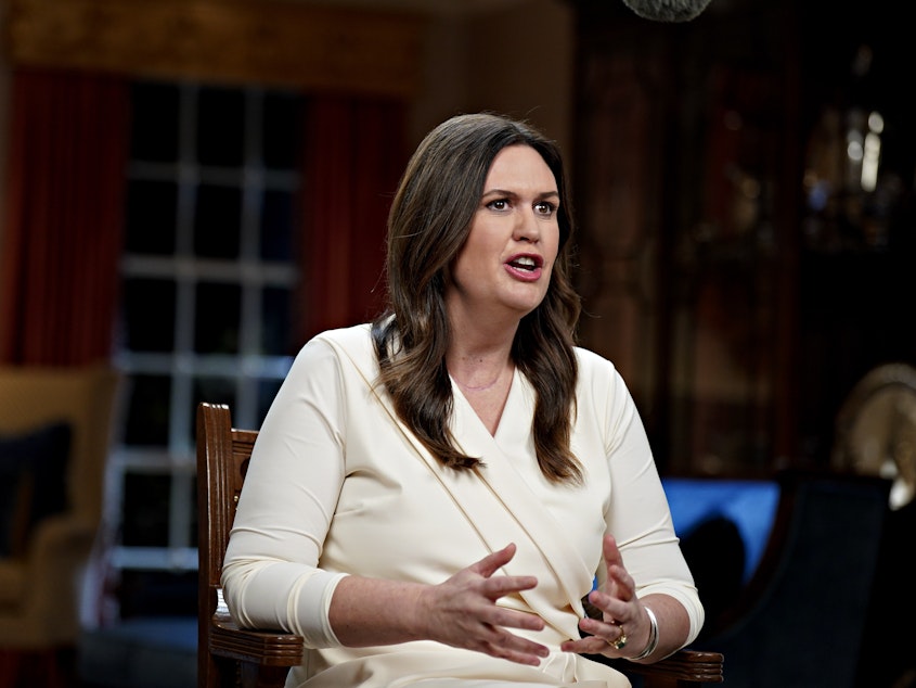 caption: Arkansas Gov. Sarah Huckabee Sanders delivers the Republican response to President Biden's State of the Union address on Feb. 7 in Little Rock, Ark. Sanders signed a law this week making it easier to employ kids under 16.