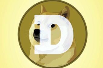 caption: This mobile phone app screen shot shows the logo for Dogecoin.
