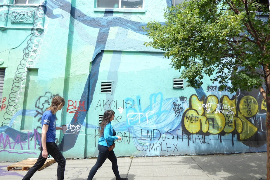 caption: Graffiti and messages cover the walls at the Capitol Hill Autonomous Zone, or CHAZ, an area taken over by demonstrators after police retreated. Shown here on June 11, 2020.