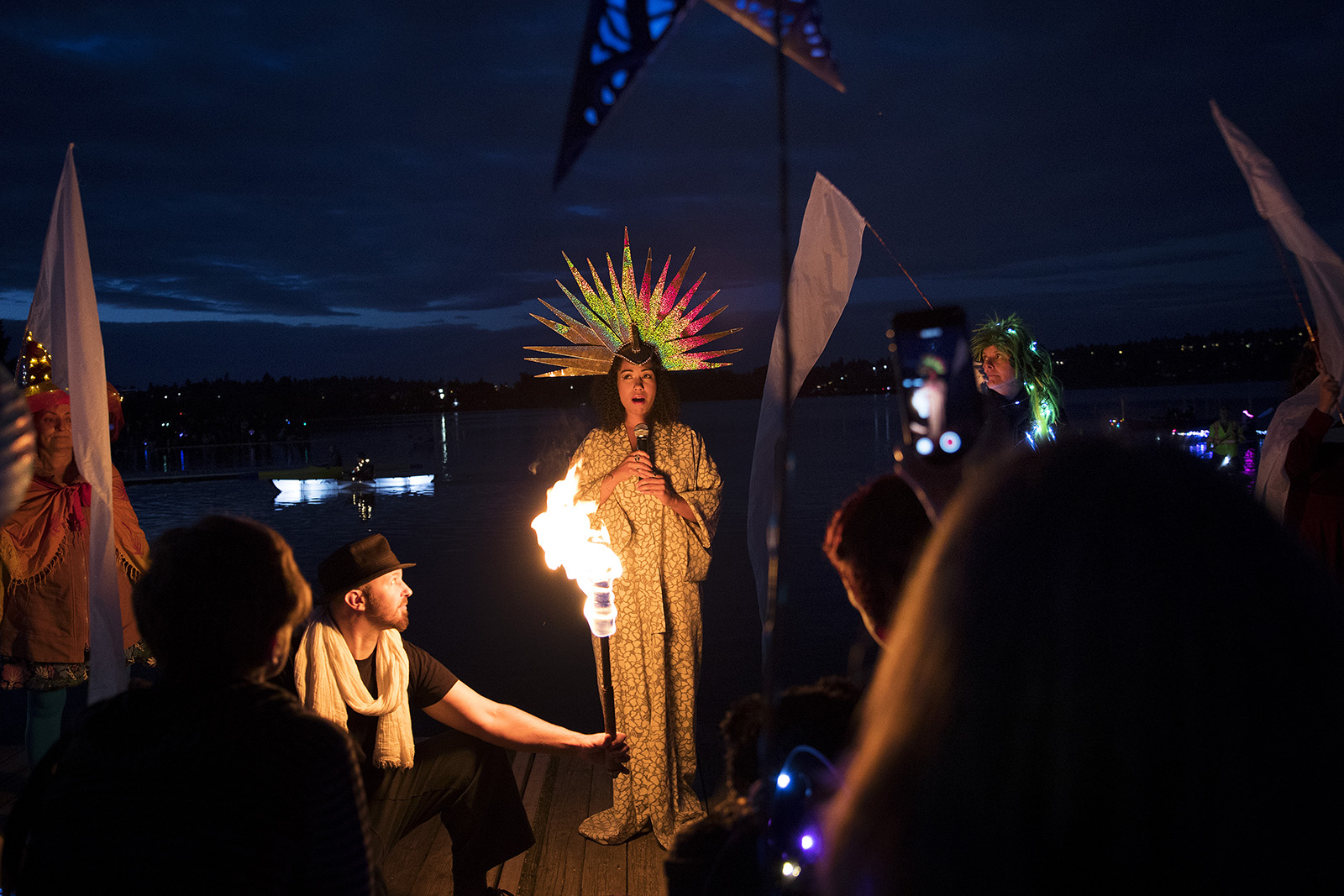 caption: The Luminata lantern parade begins with a performance on Thursday, September 21, 2017, at Green Lake in Seattle. 
