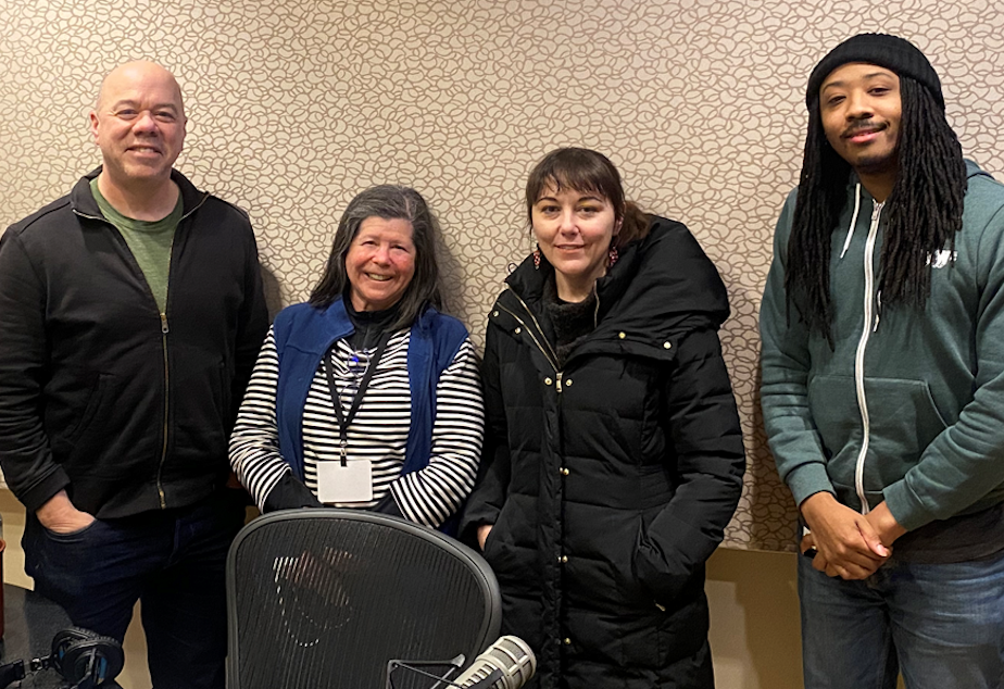 caption: Week in Review guest host Mike Lewis discusses the news with Publicola’s Erica Barnett, KUOW’s Mike Davis, and freelance health journalist Joanne Silberner.