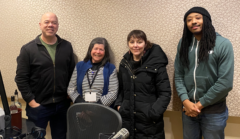 caption: Week in Review guest host Mike Lewis discusses the news with Publicola’s Erica Barnett, KUOW’s Mike Davis, and freelance health journalist Joanne Silberner. 