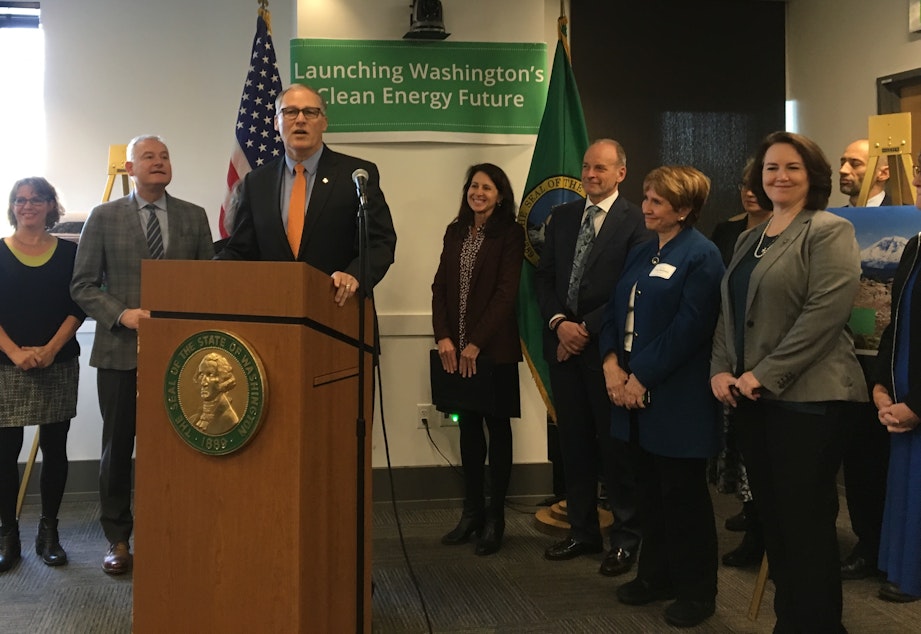 caption: Washington Gov. Jay Inslee unveils a package of clean-energy proposals in Seattle.