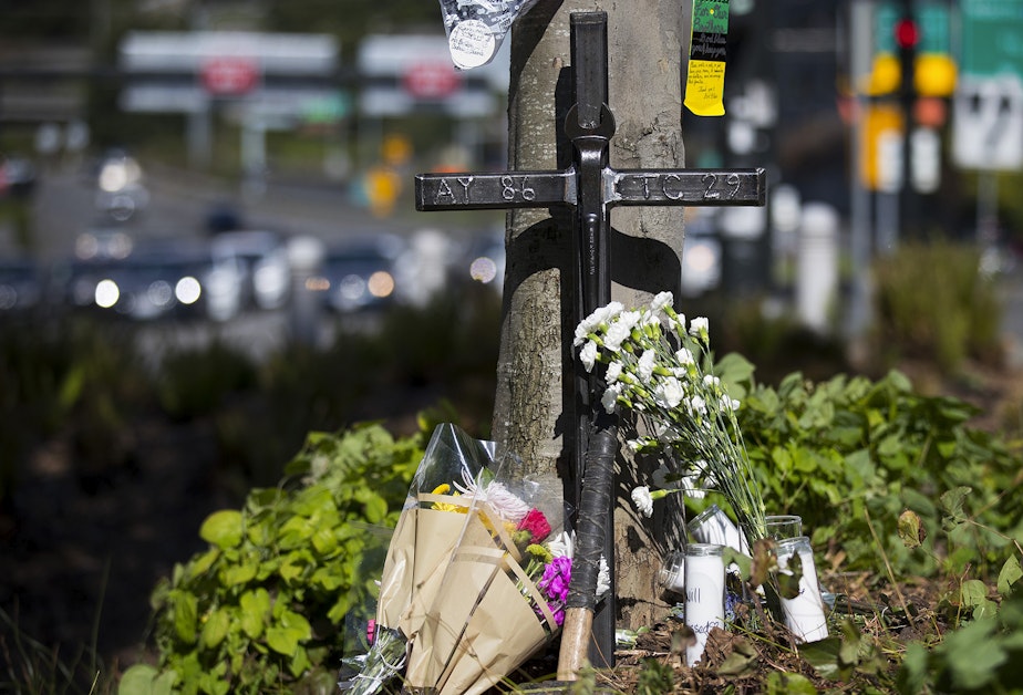 caption: A memorial is shown near the scene of the fatal crane collapse on Monday, April 29, 2019, on Mercer Street in Seattle.