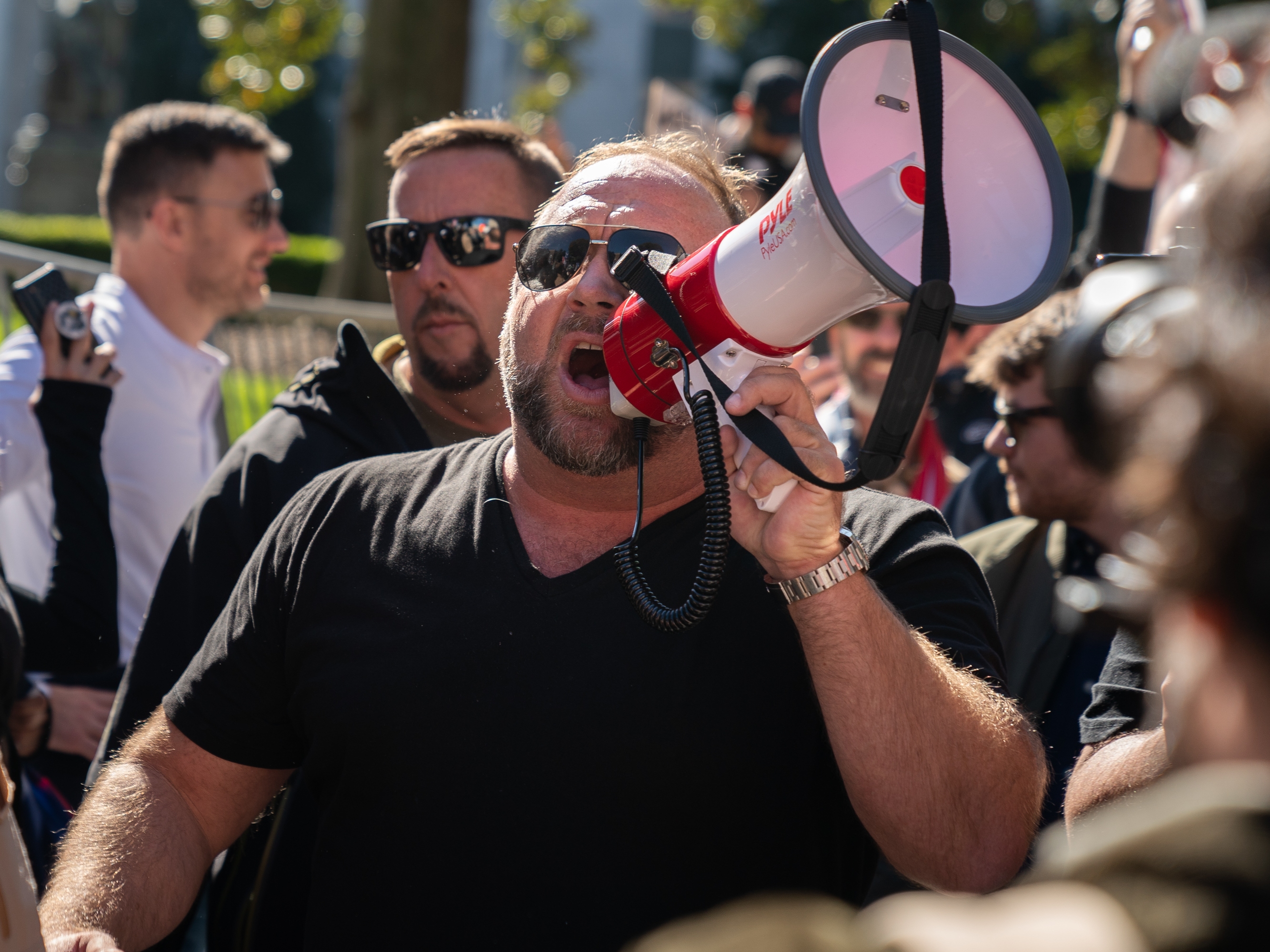 caption: Conspiracy theorist and Infowars host Alex Jones owes some $1.5 billion in damages to Sandy Hook families for his lies that the 2012 school shooting never happened.