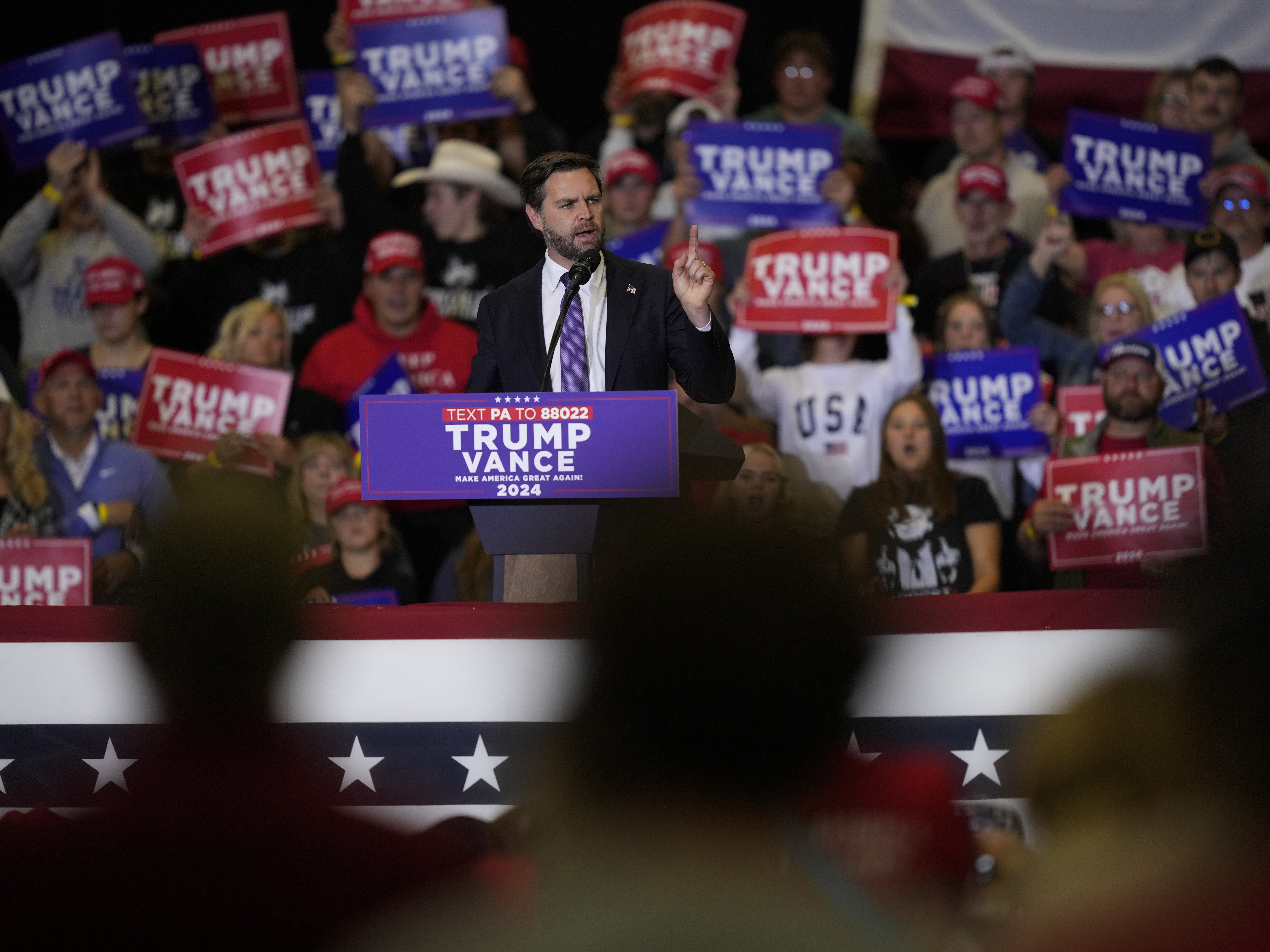 caption: Republican vice presidential nominee Sen. JD Vance, R-Ohio, speaks during a campaign event Wednesday in Williamsport, Pa.