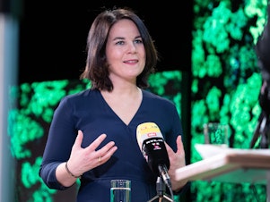 caption: With the Greens now leading the polls, party co-chair Annalena Baerbock, 40, is seen as a serious contender for German chancellor in September's general election. She has moved the Greens increasingly to the political center.