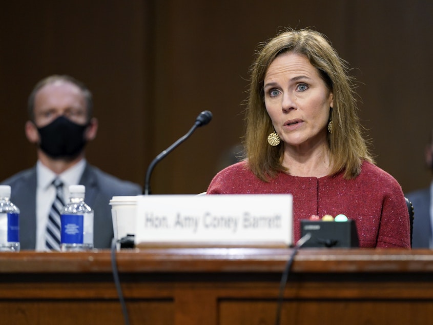 caption: Supreme Court nominee Amy Coney Barrett speaks during a confirmation hearing before the Senate Judiciary Committee on Tuesday.