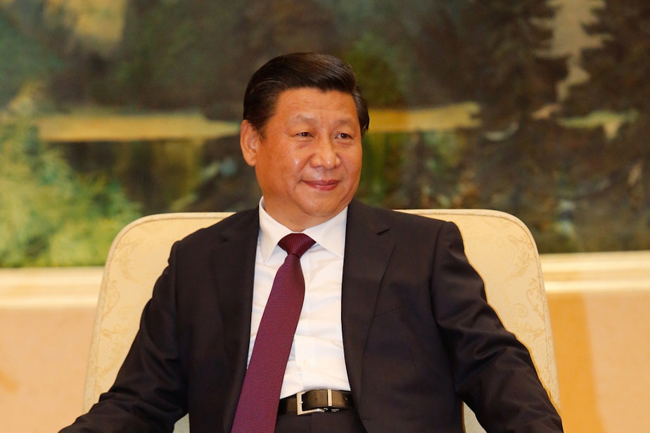 caption: China President Xi Jinping.