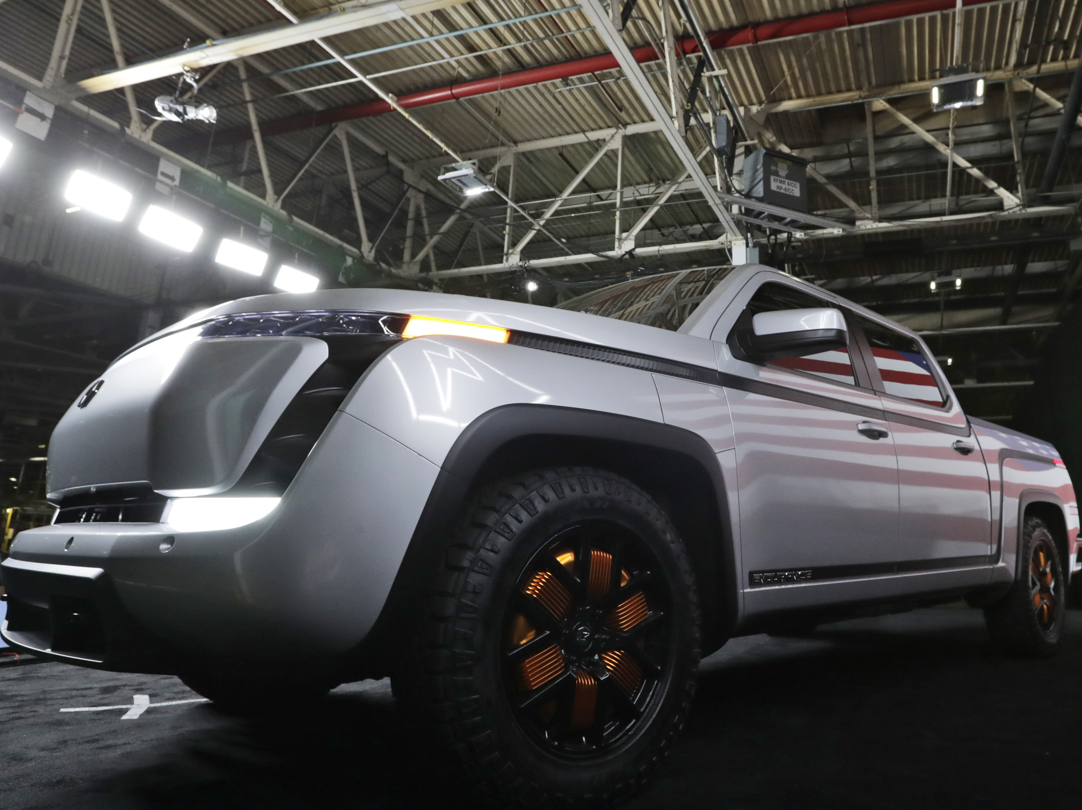 caption: Lordstown Motors shows off a model of its electric pickup truck, Endurance, in Lordstown, Ohio, on June 25, 2020. The auto maker is under pressure after saying it was running out of cash, raising questions about the future of the crop of startups that have entered the industry.
