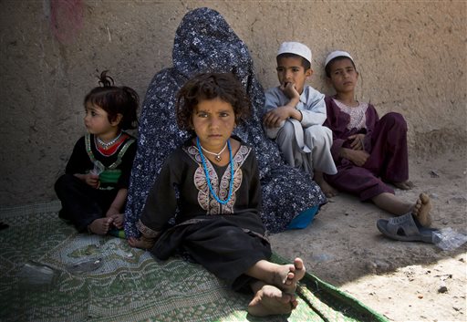 caption: Masooma, pictured with her children, recounted the events of pre-dawn March 11, 2012 when she says a U.S. soldier rampaged through two villages killing 16 people, mostly children. Staff Sergeant Robert Bales pleaded guilty to the massacre.