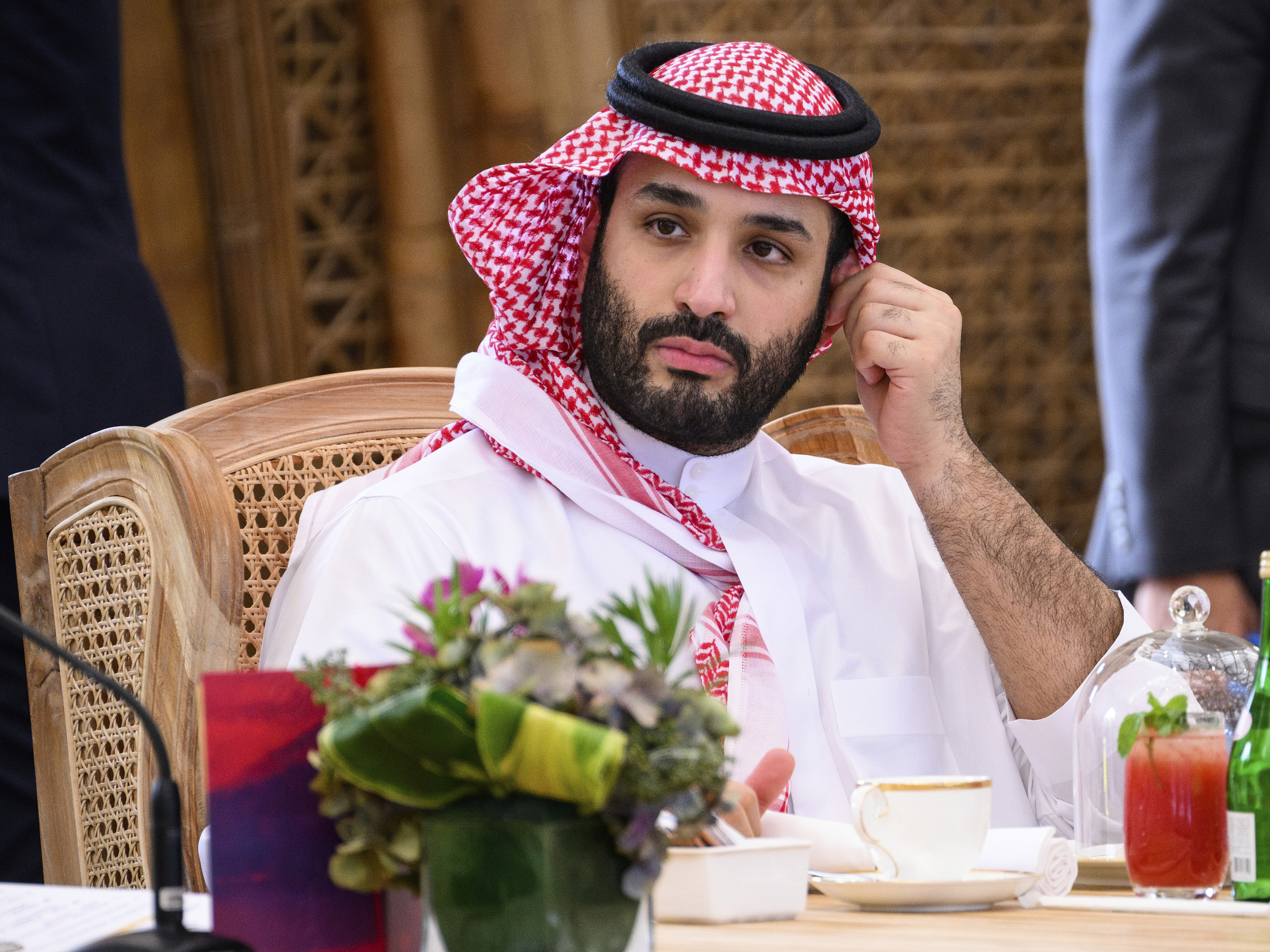 caption: Crown Prince Mohammed bin Salman of Saudi Arabia takes his seat ahead of a working lunch at the G20 Summit, Tuesday, Nov. 15, 2022, in Nusa Dua, Bali, Indonesia.