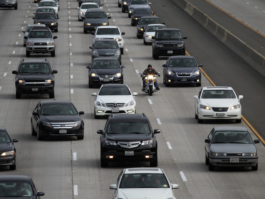 caption: Morning traffic fills a freeway in Los Angeles. Seventeen automakers signed a letter to the Trump administration and California Gov. Gavin Newsom saying they want one set of policies to reduce greenhouse gases and make cars more fuel efficient.