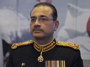 caption: Lt. Gen. Syed Asim Munir, seen here on Nov. 1, has been appointed to replace Gen. Qamar Javed Bajwa as head of Pakistan's army when Bajwa completes his term on Nov. 29. Munir, Pakistan's former spy chief, begins his new role amid bitter feuding between Prime Minister Shahbaz Sharif and former premier Imran Khan. Khan has accused Bajwa of playing a role in his ouster, a charge Bajwa has denied.