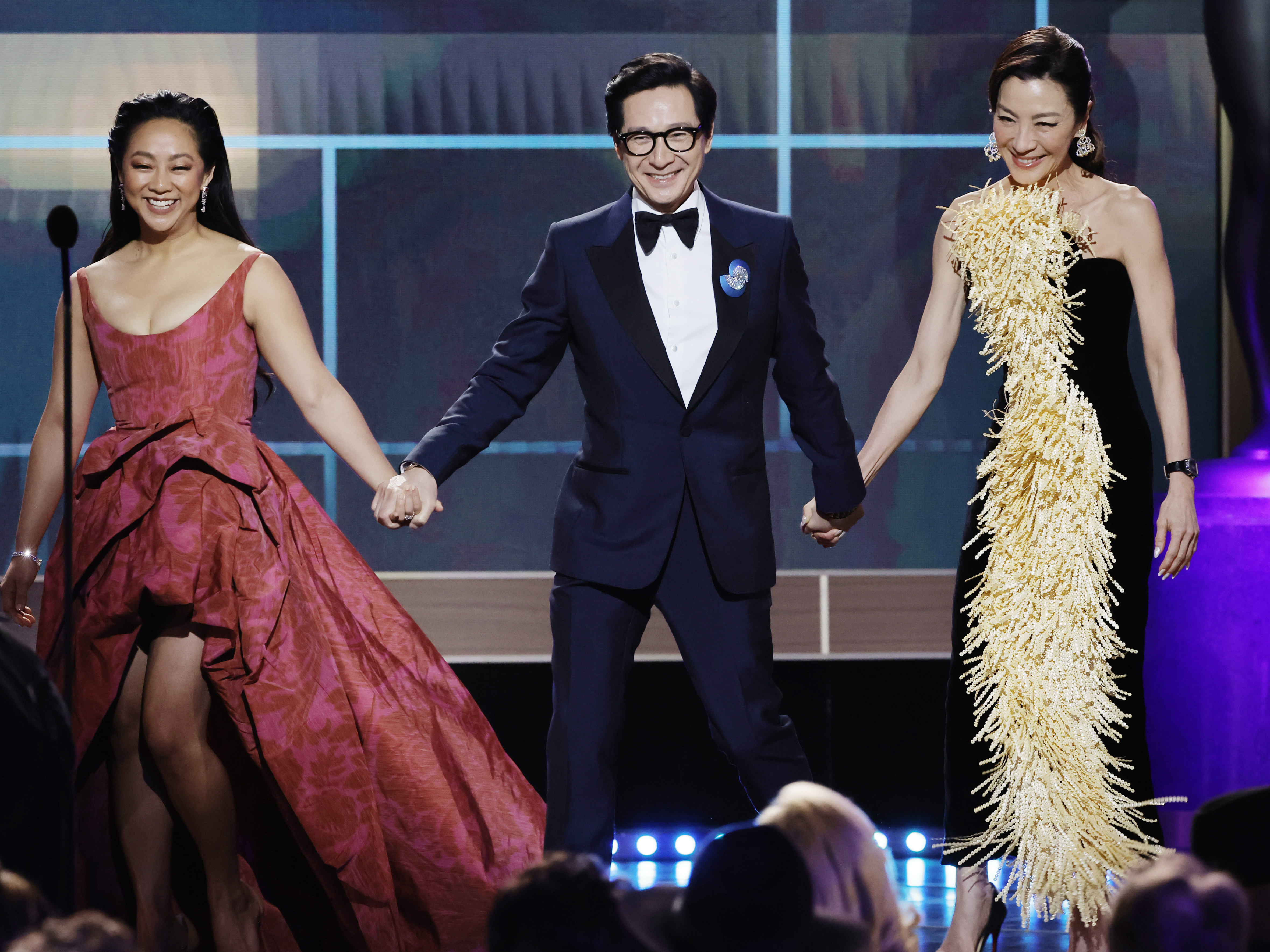 caption: Stephanie Hsu, Ke Huy Quan and Michelle Yeoh appear onstage during the 29th Annual Screen Actors Guild Awards on Feb. 26, 2023 in Los Angeles, Calif.