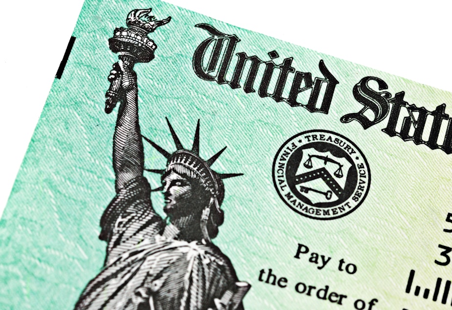 caption: Direct-deposit economic relief money is expected to be weeks ahead of physical checks. Supporters of digital currency say that transaction could — and should — be even faster.