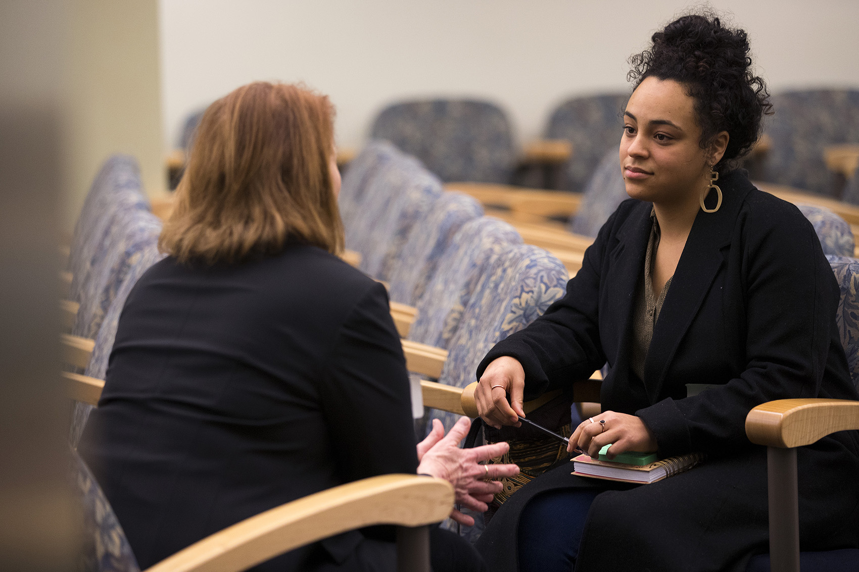 caption: Judge Mary Roberts (left) with Seattle University graduate student Georgia Burns at KUOW's Ask a Judge event. 