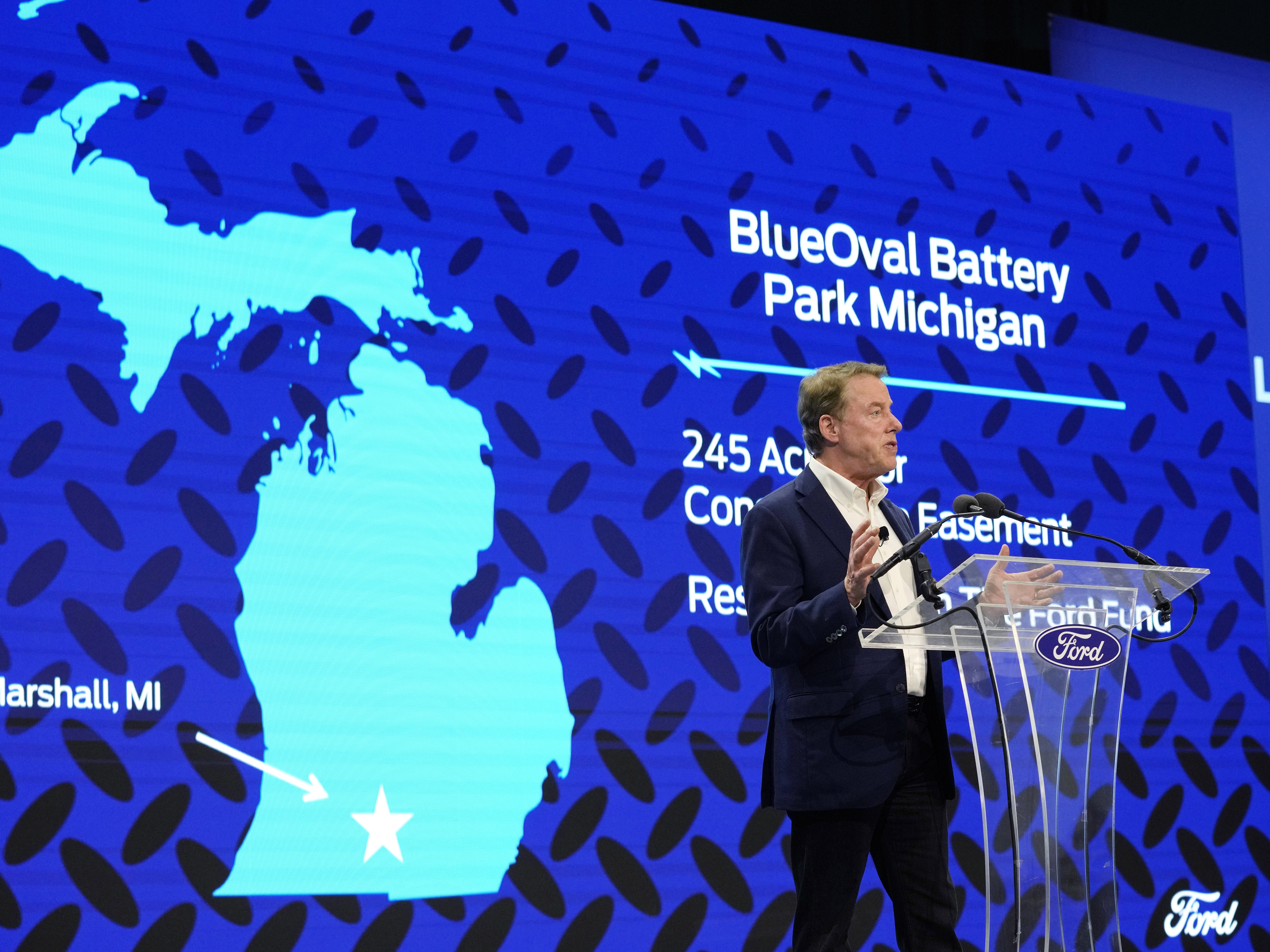 caption: Ford Motor Co. Executive Chairman Bill Ford announces the automaker's new BlueOval Battery Park, Feb. 13, 2023, in Romulus, Mich.