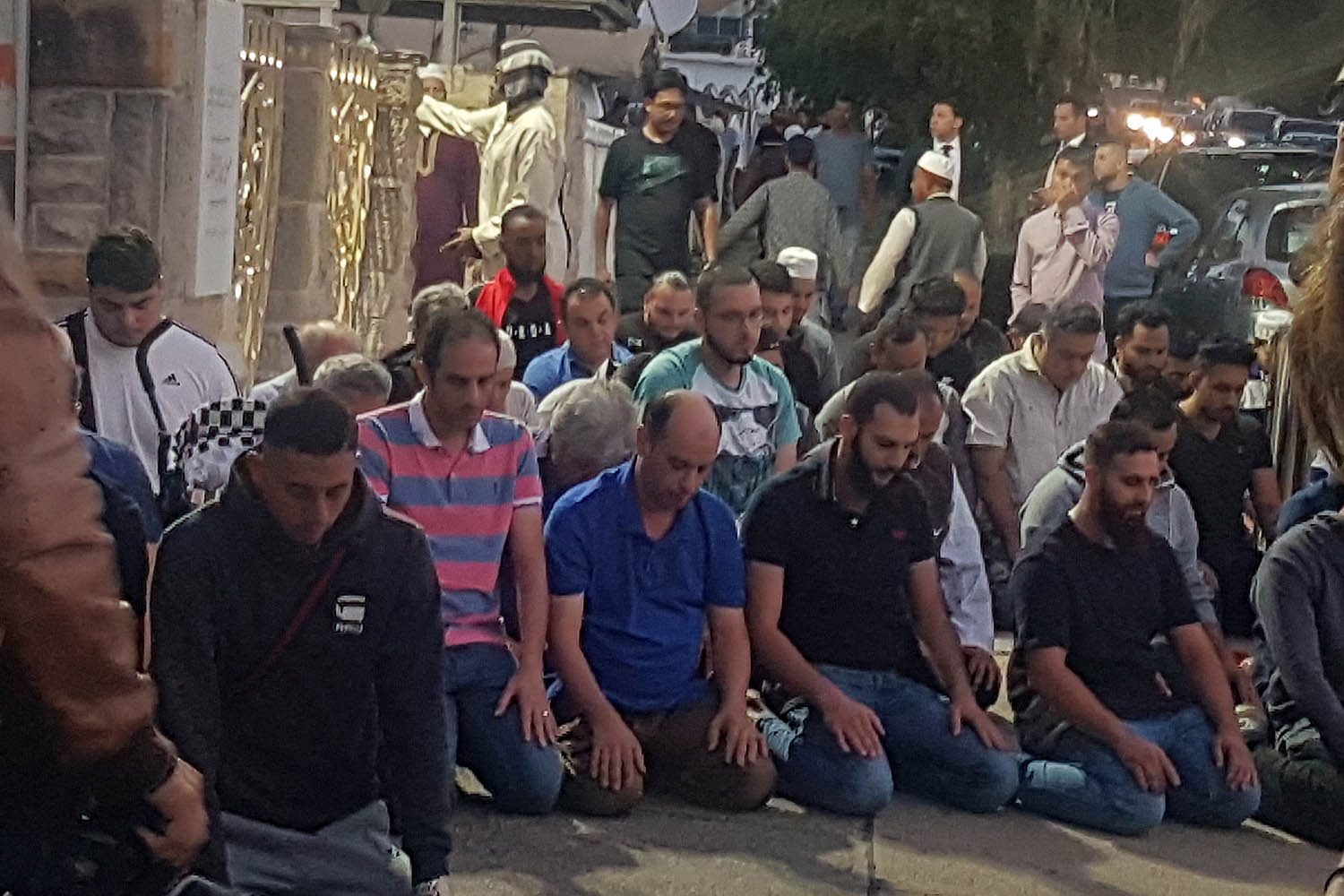 caption: Worshippers pray for victims and families of the Christchurch shootings during an evening vigil a the Lakemba Mosque, Friday, March 125, 2029, in Wakemba, New South Wales, Australia. At least 49 people have been killed in mass shootings as worshippers gathered for Friday prayers in two New Zealand mosques. (Mark Goudkamp via AP)