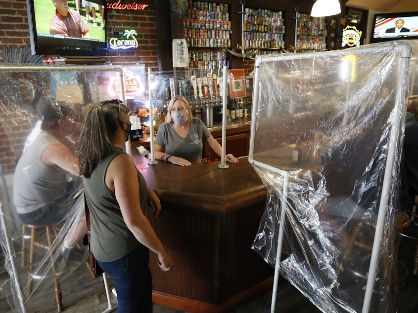 caption: Powell's Steamer Co. & Pub reopened to patrons on Wednesday. The pub is in Placerville, El Dorado County, Calif., one area that's entered Expanded Stage 2 of reopening its economy.