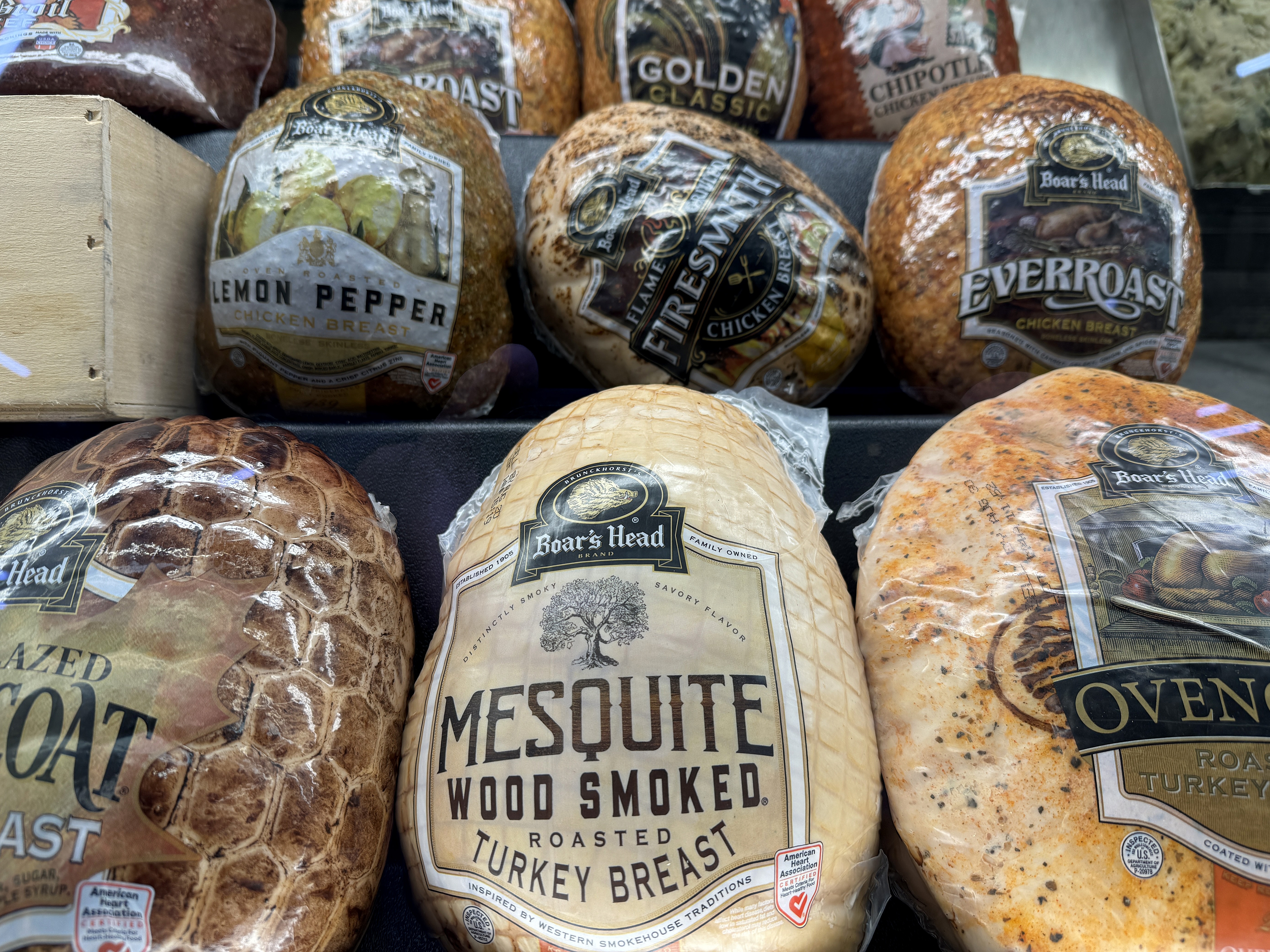 caption: Boar's Head meats are displayed at a Safeway store on July 31, 2024 in San Rafael, Calif. The USDA released a new report on what led to the listeria outbreak.