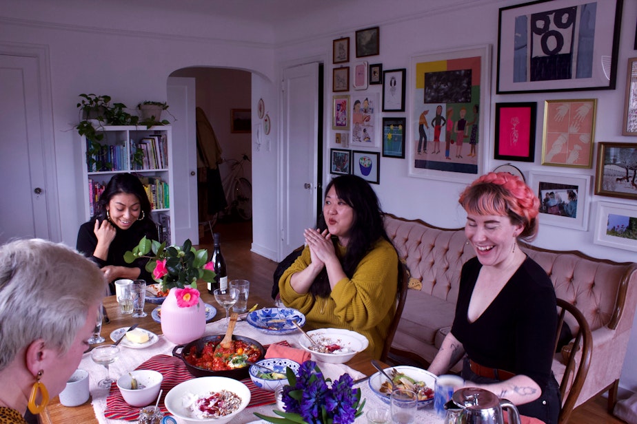 A group gathers for Tender Heart Supper Club dinner in the before times