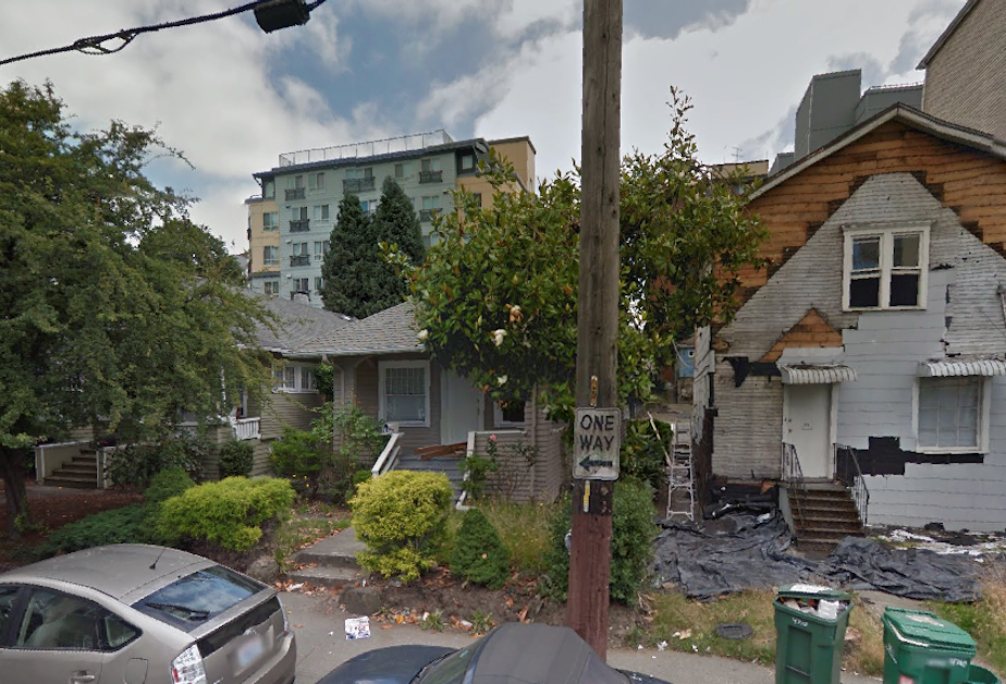 caption: The Google street view of Wolfe Maykut's college haunt. He lived in the house on the left.